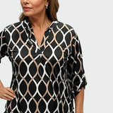 "Camisa Casual de Manga Longa" can be rewritten as "Camisa Elegante de Manga Longa para Uso Diário".